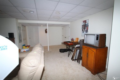 This is a rare find.  2102 square foot one story villa over on Carrington Golf Club in Michigan - for sale on GolfHomes.com, golf home, golf lot