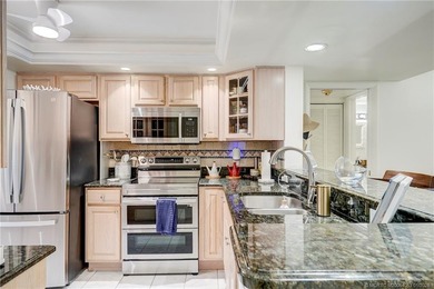 Breathtaking river views welcome you to this first-floor on Ocean Club At the Hutchinson Island Beach Resort in Florida - for sale on GolfHomes.com, golf home, golf lot