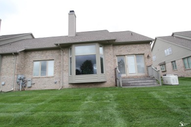 This is a rare find.  2102 square foot one story villa over on Carrington Golf Club in Michigan - for sale on GolfHomes.com, golf home, golf lot