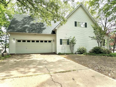 Welcome to your dream home nestled near the prestigious River on The Course at River Oaks in Arkansas - for sale on GolfHomes.com, golf home, golf lot