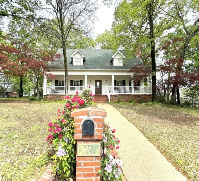 Welcome to your dream home nestled near the prestigious River on The Course at River Oaks in Arkansas - for sale on GolfHomes.com, golf home, golf lot