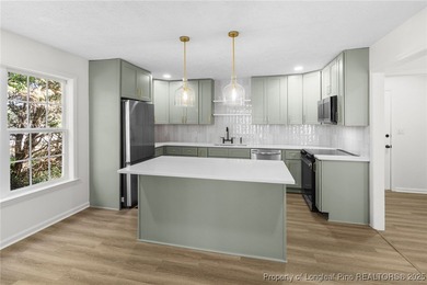 Wake up every day to serene views of the Golfview Greenway, in on Hope Mills Golf and Country Club in North Carolina - for sale on GolfHomes.com, golf home, golf lot