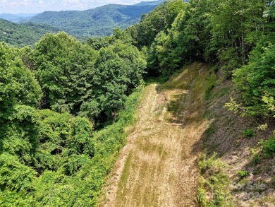 Located in the beautiful community of Big Springs Cove Estates on Maggie Valley Resort and Country Club in North Carolina - for sale on GolfHomes.com, golf home, golf lot