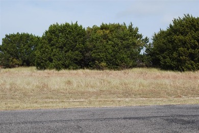 0.29 acre lot that has been cleared of large trees and brush on White Bluff Resort - Old Course in Texas - for sale on GolfHomes.com, golf home, golf lot