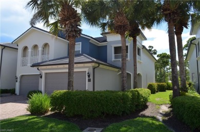 This is a beautiful second floor end unit with a green space on Pelican Sound Golf and River Club in Florida - for sale on GolfHomes.com, golf home, golf lot