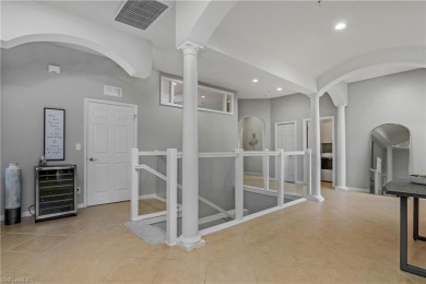 This is a beautiful second floor end unit with a green space on Pelican Sound Golf and River Club in Florida - for sale on GolfHomes.com, golf home, golf lot