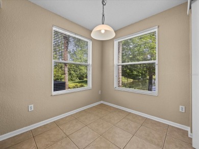 Enjoy Florida living in this delightful first-floor, end unit on ChampionsGate Golf Resort in Florida - for sale on GolfHomes.com, golf home, golf lot
