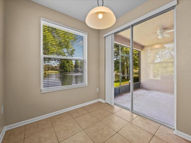 Enjoy Florida living in this delightful first-floor, end unit on ChampionsGate Golf Resort in Florida - for sale on GolfHomes.com, golf home, golf lot