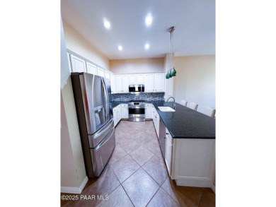 Owned Solar! Whether you're looking to retire or raise a family on Quail Wood Greens Golf Course in Arizona - for sale on GolfHomes.com, golf home, golf lot