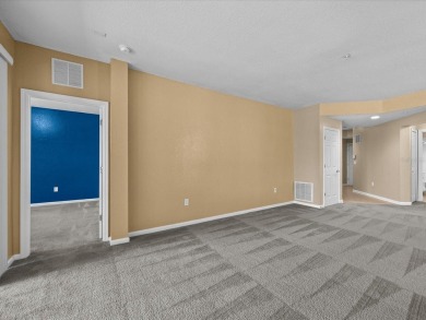 Enjoy Florida living in this delightful first-floor, end unit on ChampionsGate Golf Resort in Florida - for sale on GolfHomes.com, golf home, golf lot