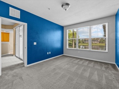 Enjoy Florida living in this delightful first-floor, end unit on ChampionsGate Golf Resort in Florida - for sale on GolfHomes.com, golf home, golf lot