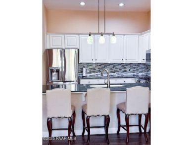 Owned Solar! Whether you're looking to retire or raise a family on Quail Wood Greens Golf Course in Arizona - for sale on GolfHomes.com, golf home, golf lot