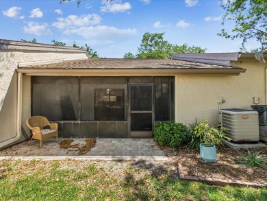 This delightful 2BR/2BA/1 Car Garage villa, nestled in the on Tarpon Springs Golf Course in Florida - for sale on GolfHomes.com, golf home, golf lot