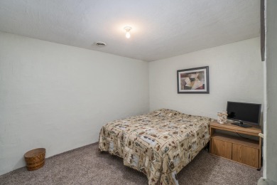 Well-maintained 4 bedroom, 2 bath home offering a spacious and on The Loon Golf Resort in Michigan - for sale on GolfHomes.com, golf home, golf lot