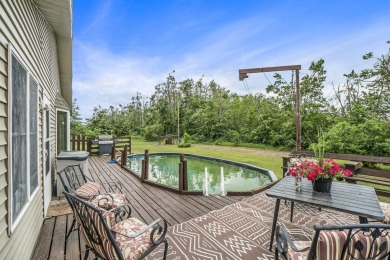 Well-maintained 4 bedroom, 2 bath home offering a spacious and on The Loon Golf Resort in Michigan - for sale on GolfHomes.com, golf home, golf lot