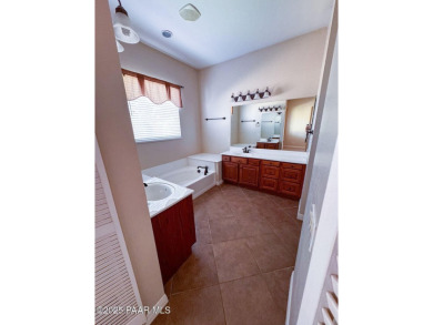 Owned Solar! Whether you're looking to retire or raise a family on Quail Wood Greens Golf Course in Arizona - for sale on GolfHomes.com, golf home, golf lot
