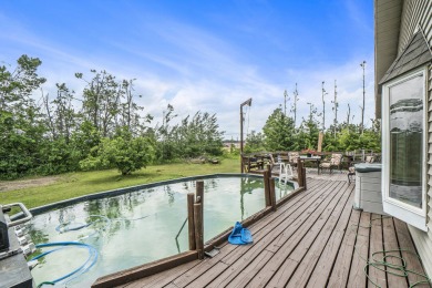 Well-maintained 4 bedroom, 2 bath home offering a spacious and on The Loon Golf Resort in Michigan - for sale on GolfHomes.com, golf home, golf lot