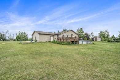Well-maintained 4 bedroom, 2 bath home offering a spacious and on The Loon Golf Resort in Michigan - for sale on GolfHomes.com, golf home, golf lot