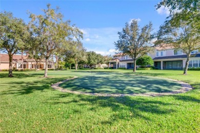 Enjoy Florida living in this delightful first-floor, end unit on ChampionsGate Golf Resort in Florida - for sale on GolfHomes.com, golf home, golf lot