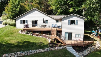 Discover your dream getaway on All Sports Lake Mecosta, part of on St. Ives Golf Club in Michigan - for sale on GolfHomes.com, golf home, golf lot