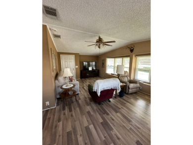 If you are looking for a home with space, then this doublewide on Anglers Green Golf Course in Florida - for sale on GolfHomes.com, golf home, golf lot