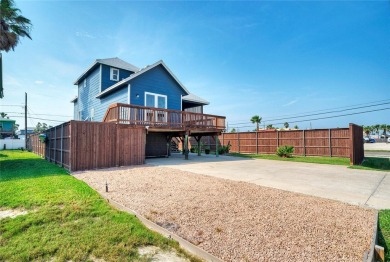 Welcome to 405 W Ave C, where coastal charm meets modern on Palmilla Beach Golf Club in Texas - for sale on GolfHomes.com, golf home, golf lot