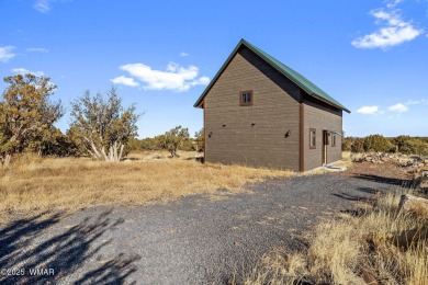 Cozy 2022 site-built cottage just down the road from the popular on Silver Creek Golf Club in Arizona - for sale on GolfHomes.com, golf home, golf lot