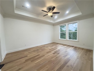 This home features beautiful woods floors throughout the home on Branchwood Golf Course in Arkansas - for sale on GolfHomes.com, golf home, golf lot