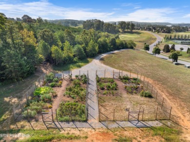 This exquisite 0.51 acre waterfront lot on Tellico Lake offers a on Wind River Golf Course in Tennessee - for sale on GolfHomes.com, golf home, golf lot
