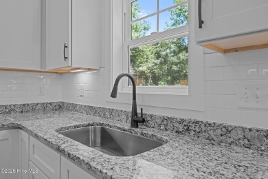 The Nautilus Floor Plan by Treweek Construction is a raised on Harbour Point Golf Club in North Carolina - for sale on GolfHomes.com, golf home, golf lot