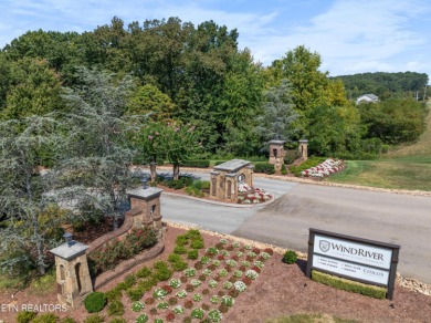 This exquisite 0.51 acre waterfront lot on Tellico Lake offers a on Wind River Golf Course in Tennessee - for sale on GolfHomes.com, golf home, golf lot