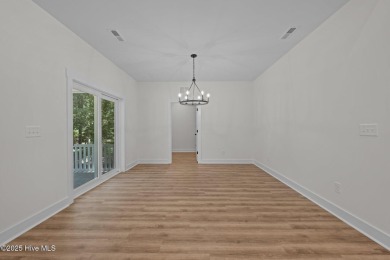 The Nautilus Floor Plan by Treweek Construction is a raised on Harbour Point Golf Club in North Carolina - for sale on GolfHomes.com, golf home, golf lot