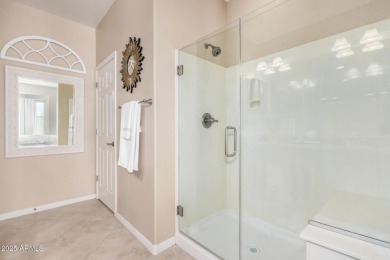 Custom lead glass entry sets the tone for this stunning duet on  in Arizona - for sale on GolfHomes.com, golf home, golf lot