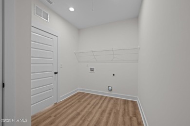 The Nautilus Floor Plan by Treweek Construction is a raised on Harbour Point Golf Club in North Carolina - for sale on GolfHomes.com, golf home, golf lot