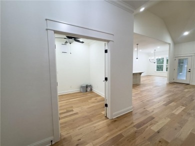 This home features beautiful woods floors throughout the home on Branchwood Golf Course in Arkansas - for sale on GolfHomes.com, golf home, golf lot