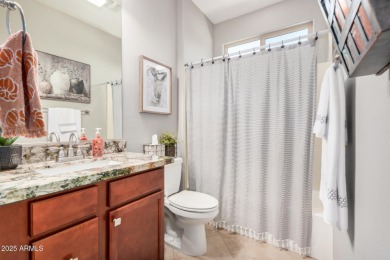 Custom lead glass entry sets the tone for this stunning duet on  in Arizona - for sale on GolfHomes.com, golf home, golf lot