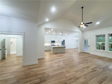 This home features beautiful woods floors throughout the home on Branchwood Golf Course in Arkansas - for sale on GolfHomes.com, golf home, golf lot