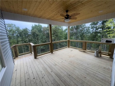 This home features beautiful woods floors throughout the home on Branchwood Golf Course in Arkansas - for sale on GolfHomes.com, golf home, golf lot