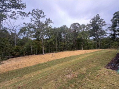 This home features beautiful woods floors throughout the home on Branchwood Golf Course in Arkansas - for sale on GolfHomes.com, golf home, golf lot