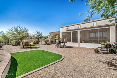 Custom lead glass entry sets the tone for this stunning duet on  in Arizona - for sale on GolfHomes.com, golf home, golf lot