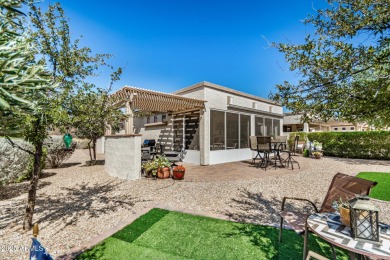 Custom lead glass entry sets the tone for this stunning duet on  in Arizona - for sale on GolfHomes.com, golf home, golf lot