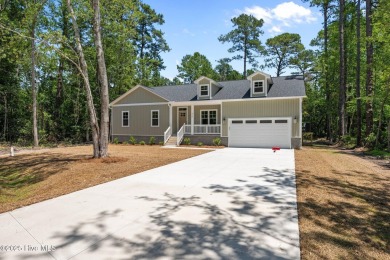 The Nautilus Floor Plan by Treweek Construction is a raised on Harbour Point Golf Club in North Carolina - for sale on GolfHomes.com, golf home, golf lot