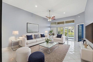 Enjoy relaxed South Florida living in this inviting 3-bedroom on Boca Delray Golf and Country Club in Florida - for sale on GolfHomes.com, golf home, golf lot