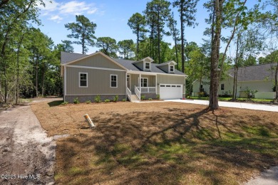 The Nautilus Floor Plan by Treweek Construction is a raised on Harbour Point Golf Club in North Carolina - for sale on GolfHomes.com, golf home, golf lot
