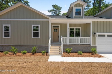 The Nautilus Floor Plan by Treweek Construction is a raised on Harbour Point Golf Club in North Carolina - for sale on GolfHomes.com, golf home, golf lot