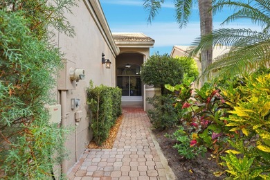 Enjoy relaxed South Florida living in this inviting 3-bedroom on Boca Delray Golf and Country Club in Florida - for sale on GolfHomes.com, golf home, golf lot