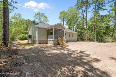 The Nautilus Floor Plan by Treweek Construction is a raised on Harbour Point Golf Club in North Carolina - for sale on GolfHomes.com, golf home, golf lot