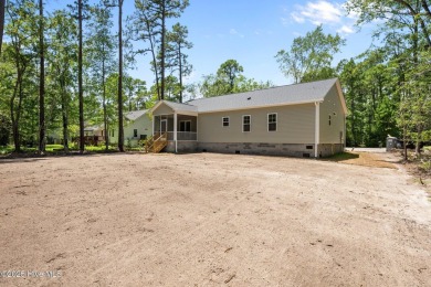 The Nautilus Floor Plan by Treweek Construction is a raised on Harbour Point Golf Club in North Carolina - for sale on GolfHomes.com, golf home, golf lot
