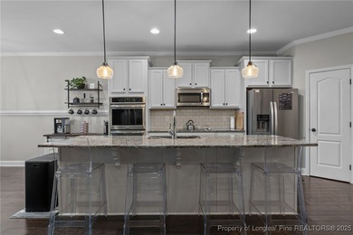 Welcome to this beautiful 4-bedroom, 3.5-bath home located in on Anderson Creek Golf Club in North Carolina - for sale on GolfHomes.com, golf home, golf lot