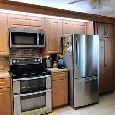 PENTHOUSE CONDO 2BR/2BTH W/DEN, WITH AMAIZING VIEW OF SUNSET on Bear Lakes Country Club in Florida - for sale on GolfHomes.com, golf home, golf lot